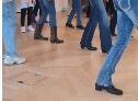 Bild von Tanzenden Füssen. Line Dance erwartet dich am Alpen Rhythmus